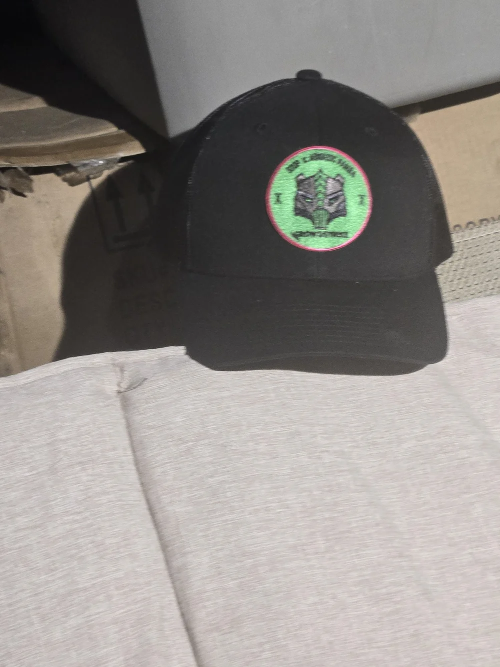 GrowStreet Black Mesh Trucker Hat with Green Patch